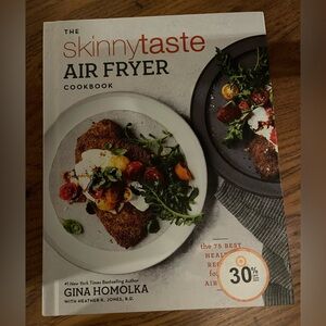 The Skinnytaste Air Fryer Cookbook, written by Gina Homolka and Heather K. Jones